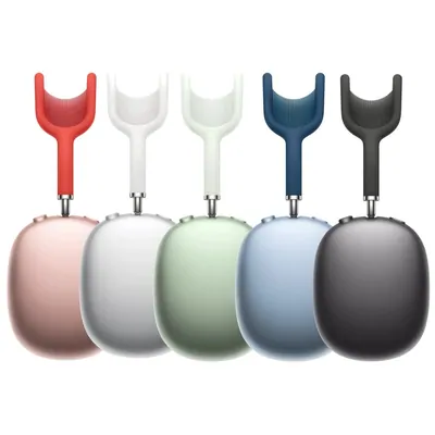 Five over-ear headphones in a row on white, in pink, silver, green, blue and dark grey