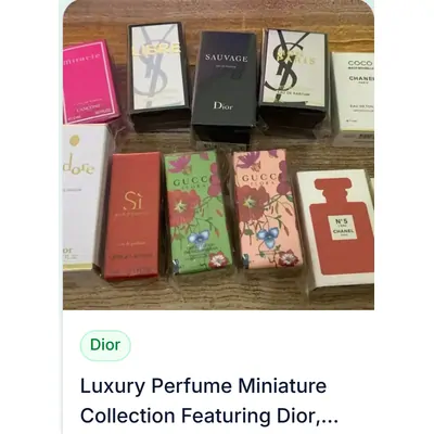 A catalogue listing for a set of boxed miniature perfumes, laid out on a wooden table